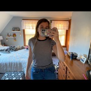 Black and white striped t-shirt.